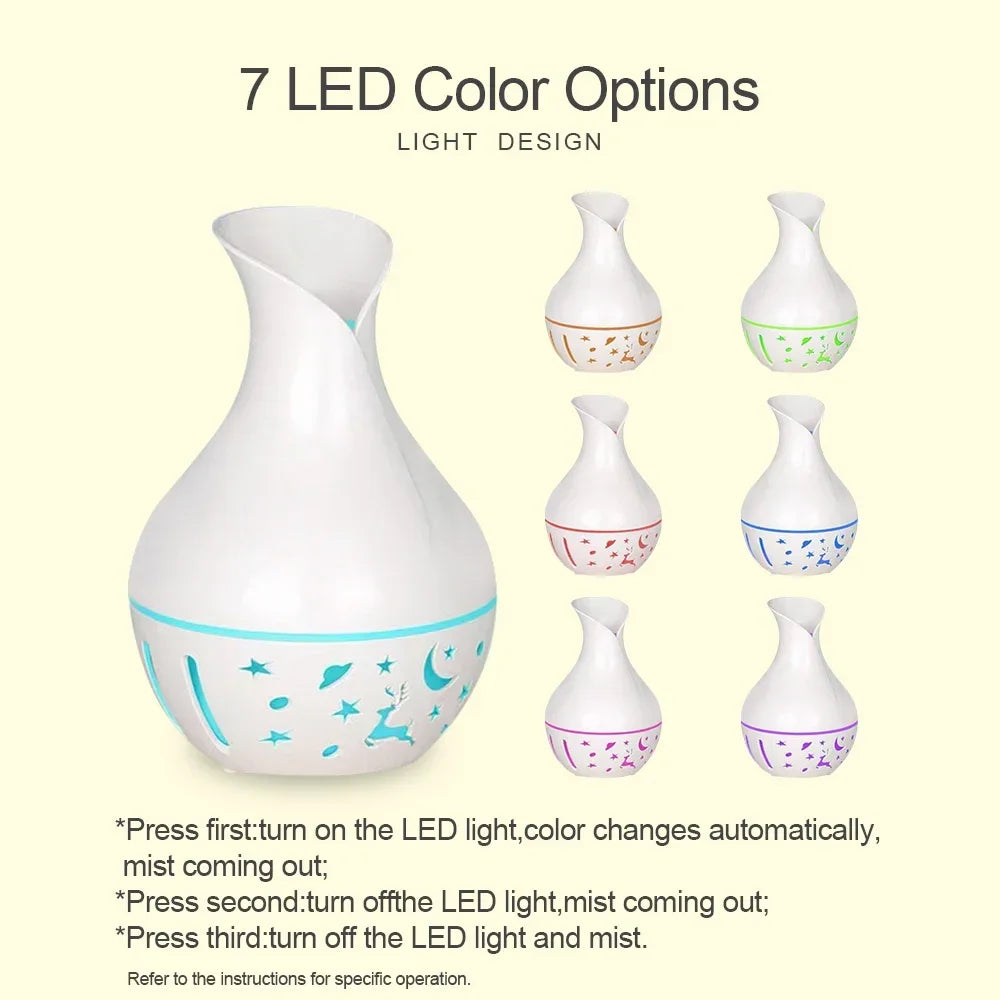 two bottles of essential oil humidifier With Aromatherapy Diffuser